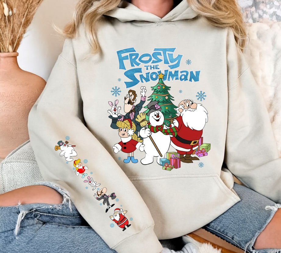Green retro Frosty The Snowman Christmas sweatshirt with sleeve prints, and beige graphic t-shirt featuring Frosty, Santa, and friends with matching back print
