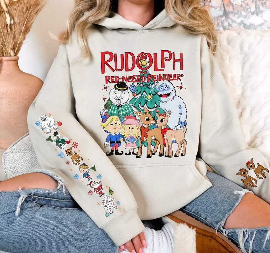 Light grey retro Rudolph The Red-Nosed Reindeer Christmas sweatshirt featuring classic characters on the front and festive sleeve prints