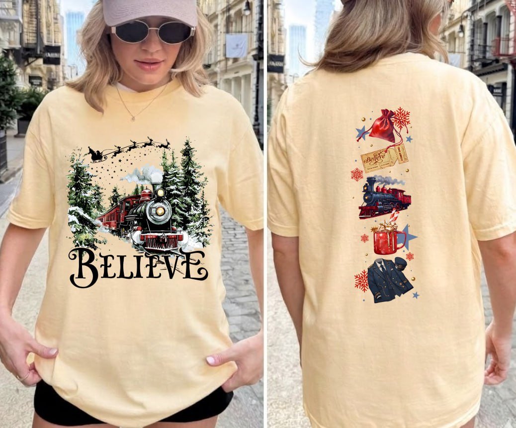 Black Christmas sweatshirt featuring a vintage train in a snowy forest with the word Believe, and Polar Express themed sleeve prints like a golden ticket and hot cocoa