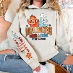Light grey retro Christmas sweatshirt featuring Heat Miser and Snow Miser, Miser Brothers Heating and Cooling graphic, and character sleeve prints