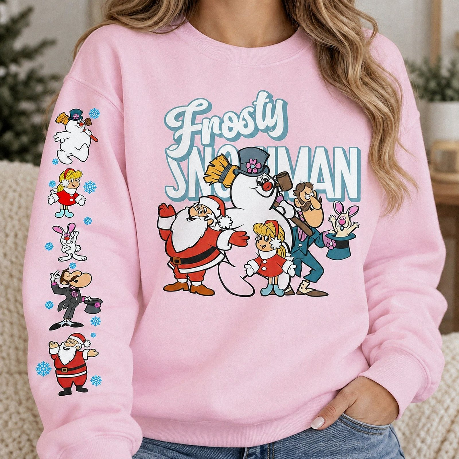 Pink Frosty The Snowman Christmas crewneck sweatshirt featuring vintage holiday graphics on the front and sleeve