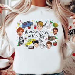 White crewneck Christmas sweatshirt featuring a retro 90s holiday movie collage design with the text "it was merrier in the 90s" alongside nostalgic characters and icons